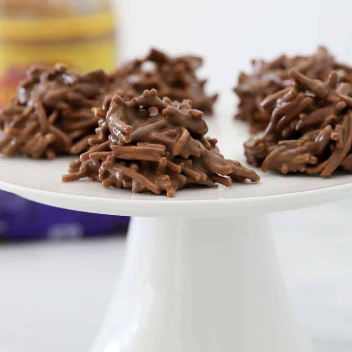 A plate full of crunchy chocolate, peanut butter and fried noodle 'spiders'