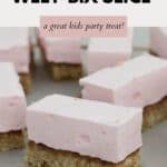 Pieces of a baked slice with a thick pale pink marshmallow topping.