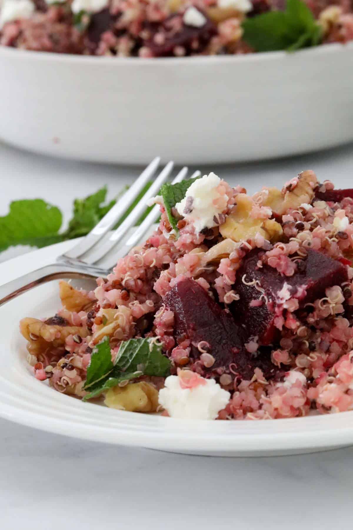 Quinoa salad with beetroot served on a plate.