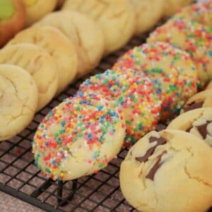 A tray lined with multiple cookies in different flavours.