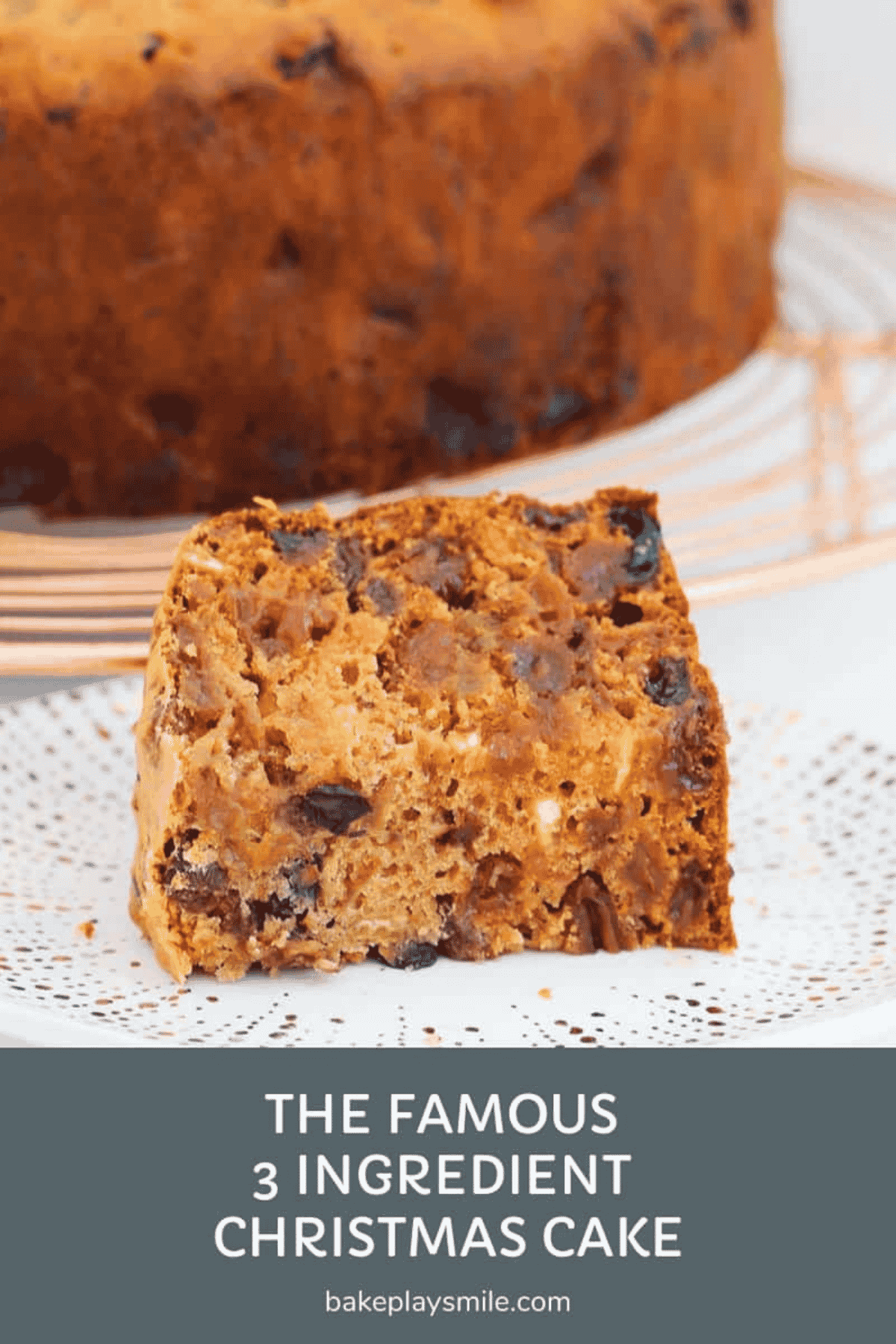 A piece of fruit cake on a plate.