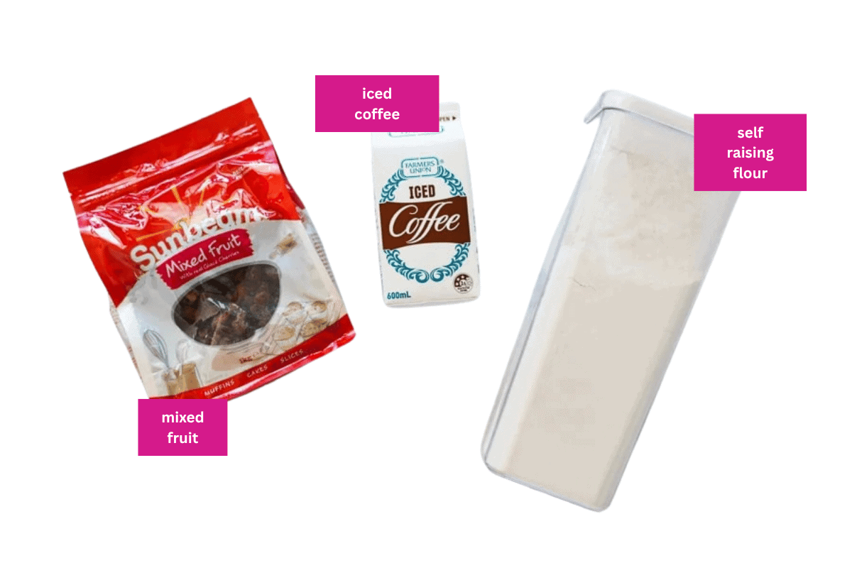 Mixed dried fruit, iced coffee and self raising flour on a white background.