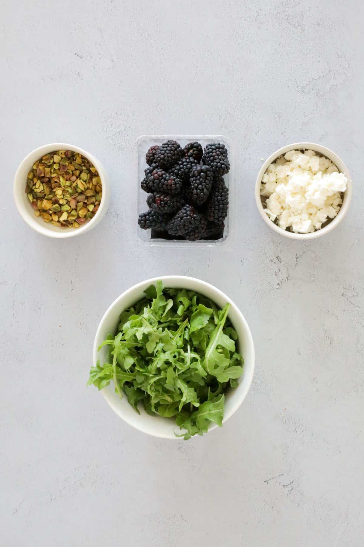 Ingredients for the salad on a banch top.