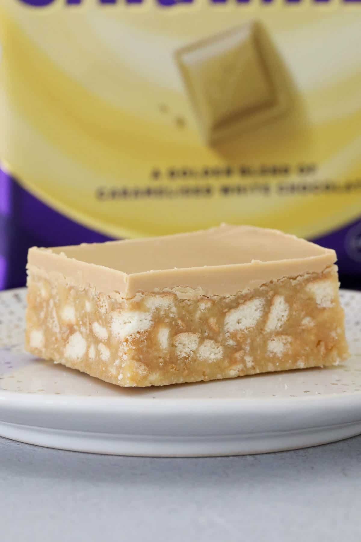 A bar of Caramel Hedgehog Slice served on a plate.