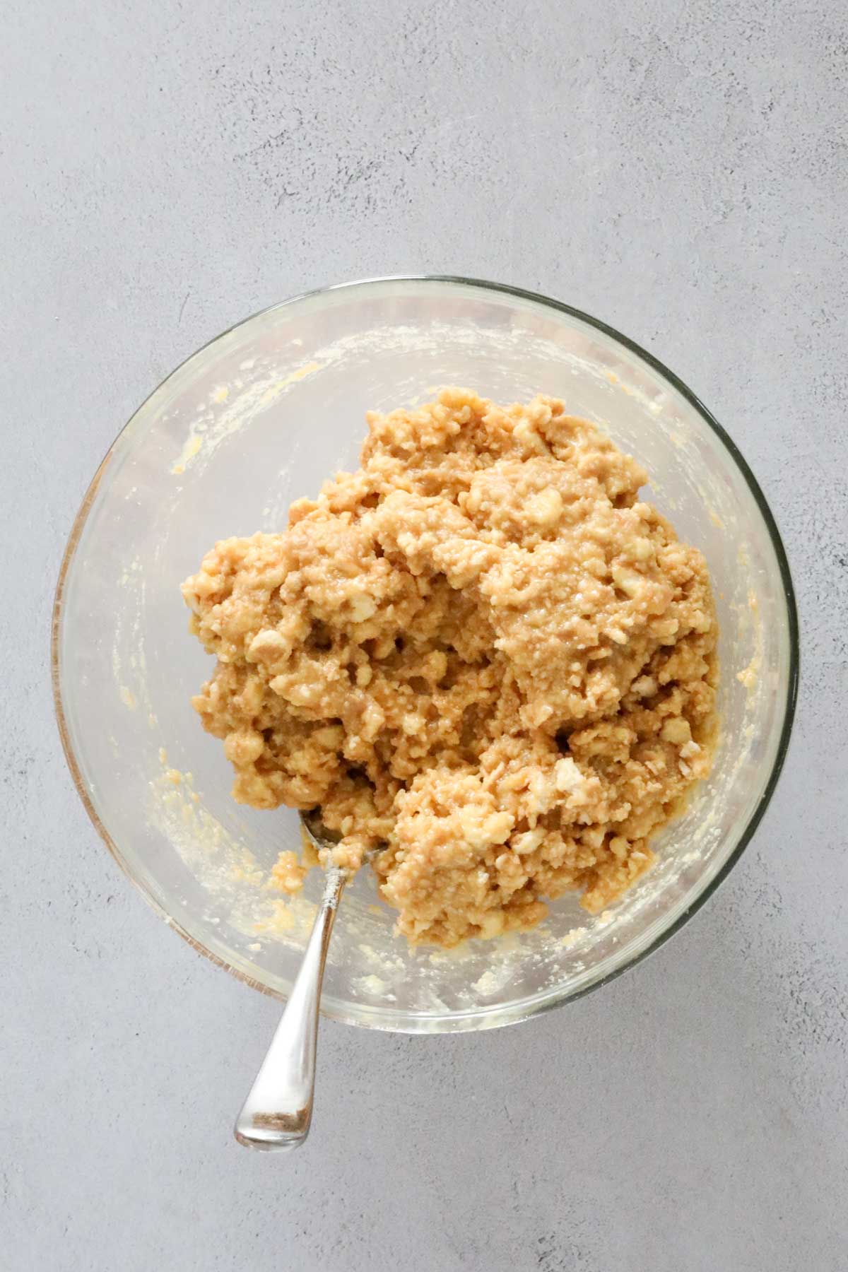 Biscuit crumbs mixed through the melted butter, condensed milk and golden syrup.