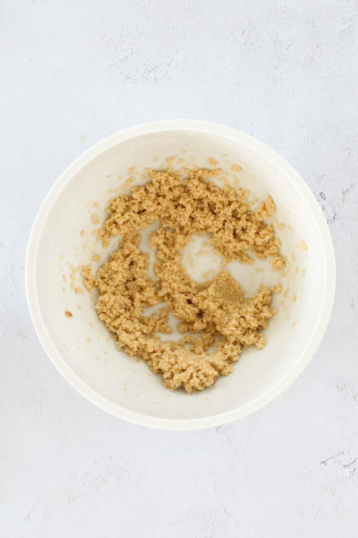 Butter, brown sugar and caster sugar creamed in a large mixing bowl.