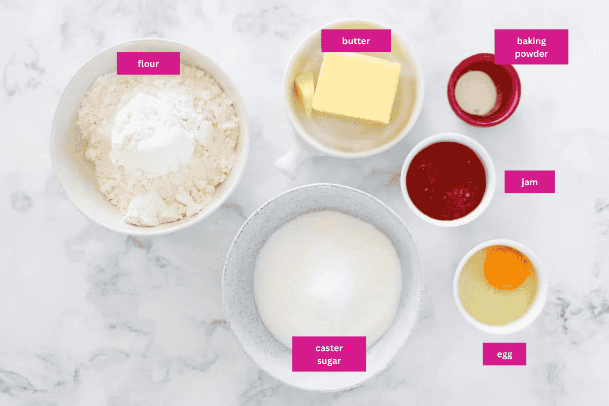 The ingredients for jam drops in small bowls.