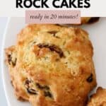 An overhead shot of a golden baked rock cake with sultanas.