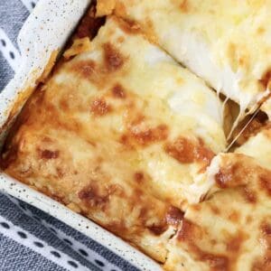 A piece of cheesy lasagne with creamy bechamel sauce.