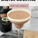 A chocolate Easter cocktail with a bottle of Baileys and vodka in the background.