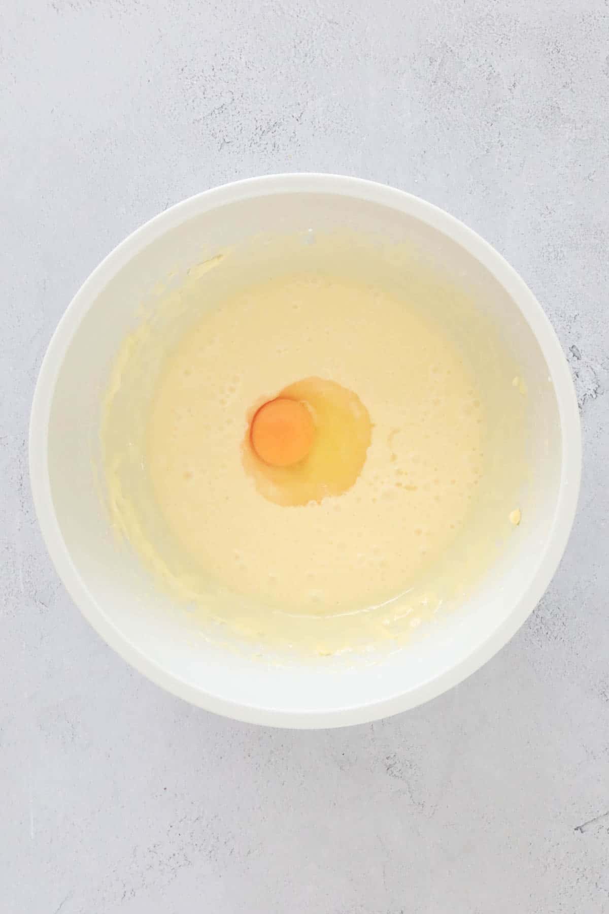 An egg on top of white mixture.