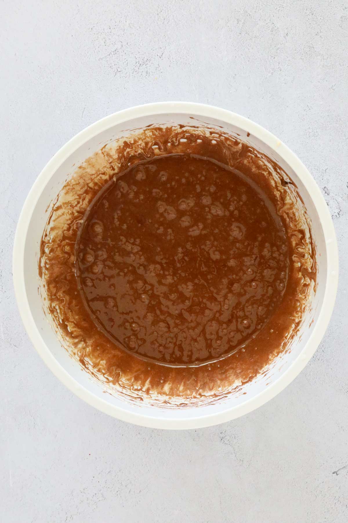 The melted chocolate mixed through the eggs and sugar.