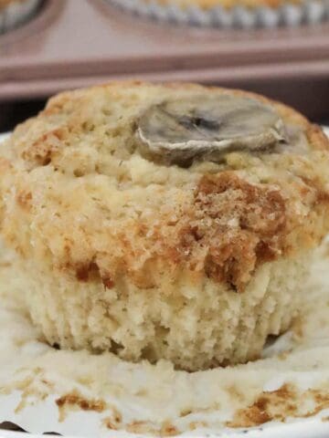 A moist banana muffin removed from it's paper case.