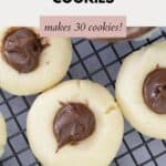 Nutella Thumbprint Cookies on a wire cooling tray.